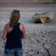 A formerly sunken boat sits on the cracked earth at Lake Mead National Recreation Area in Nevada. The reservoir is at record lows.